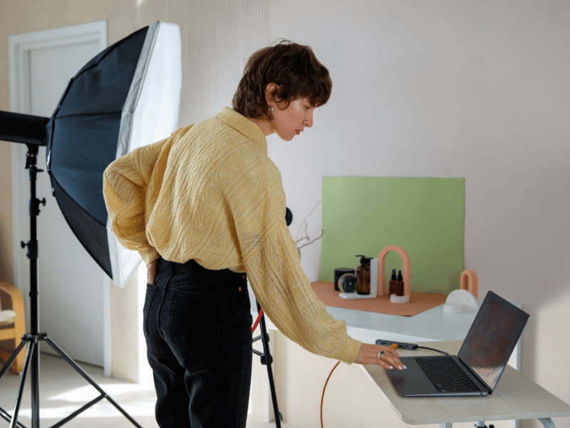 Product photographer organizing images for an ecommerce store