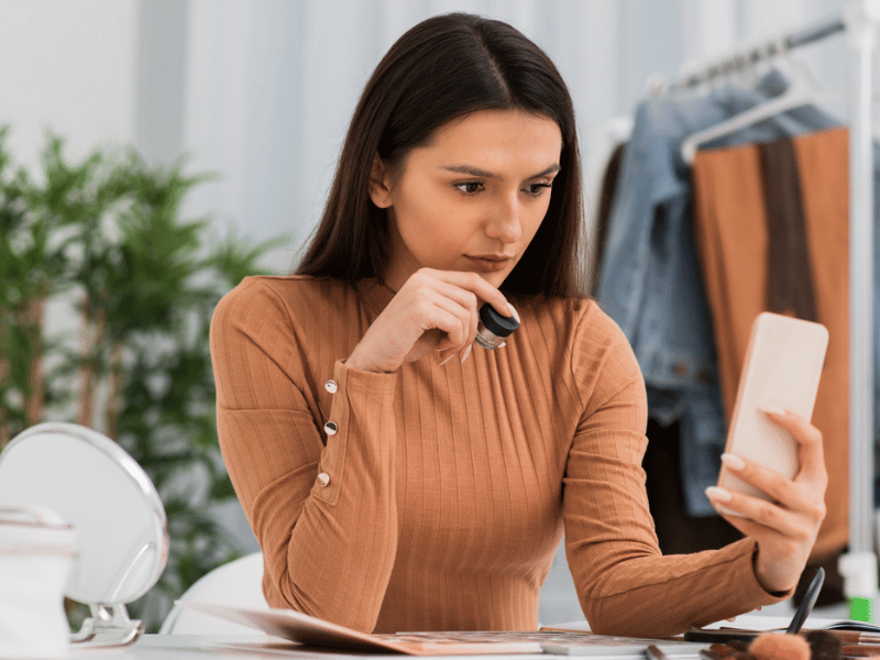 Online shopper waiting for an ecommerce website to load on a smartphone